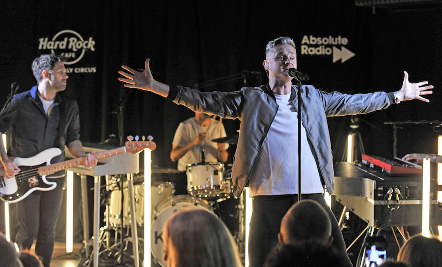 keane on stage at the opening of Hard Rock Piccadilly Circus